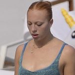 Boris Becker's lookalike daughter Anna Ermakova shows off her toned abs in sparkly blue bikini as she takes a dip in Monaco