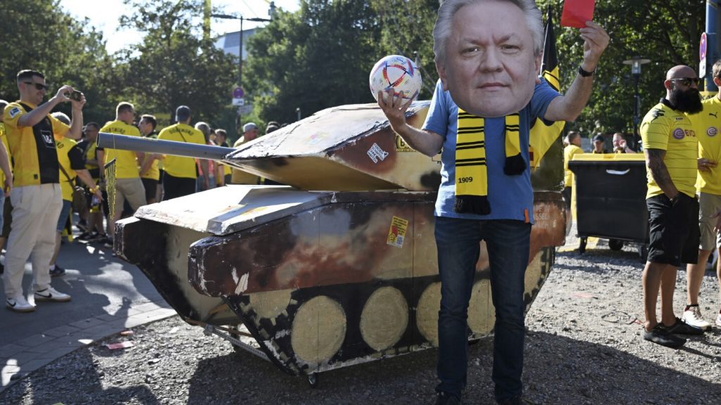 Dummy tank outside Borussia Dortmund stadium as fans protest club