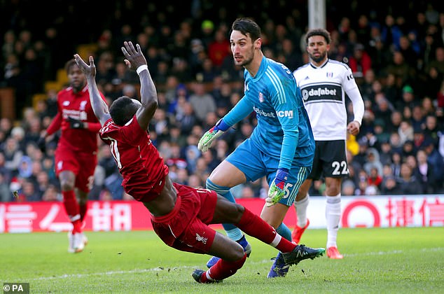 Sergio Rico lors d'un match avec Fulham contre Liverpool en 2019