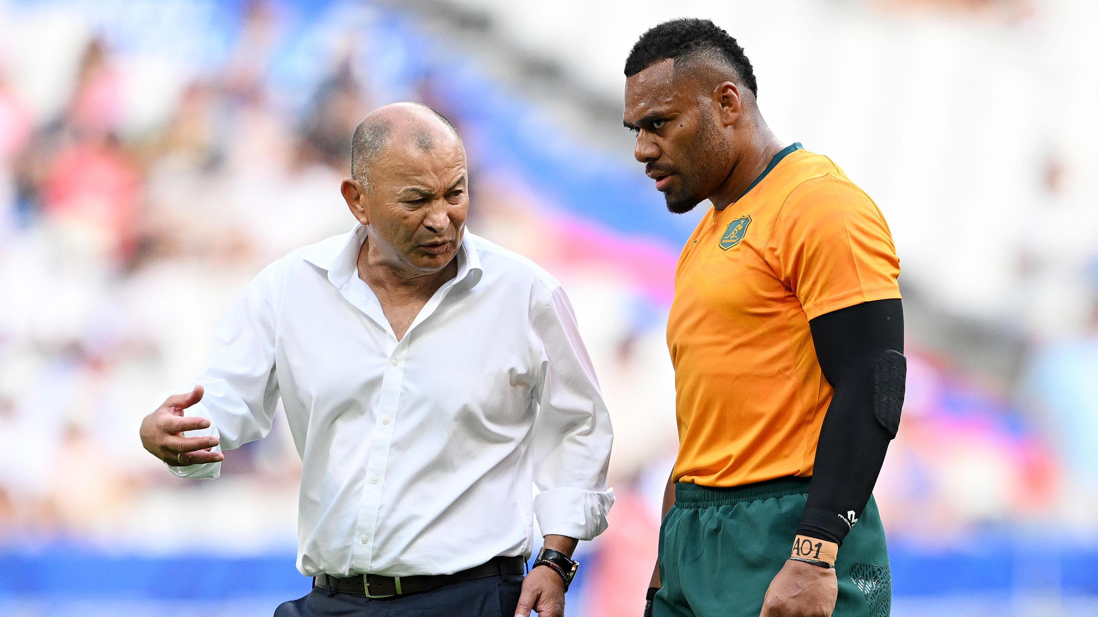 Samu Kerevi listens to Eddie Jones