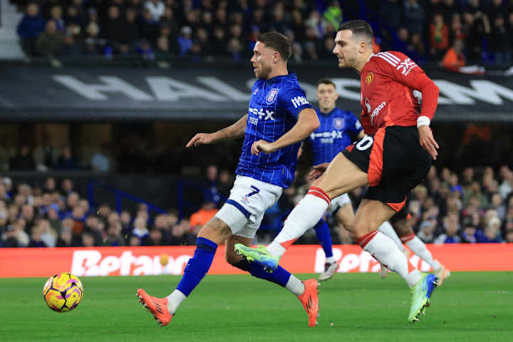 Diogo Dalot et Wes Burns