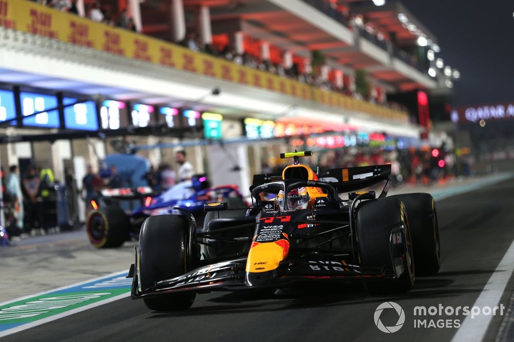 Sergio Perez, Red Bull Racing RB20, in the pit lane