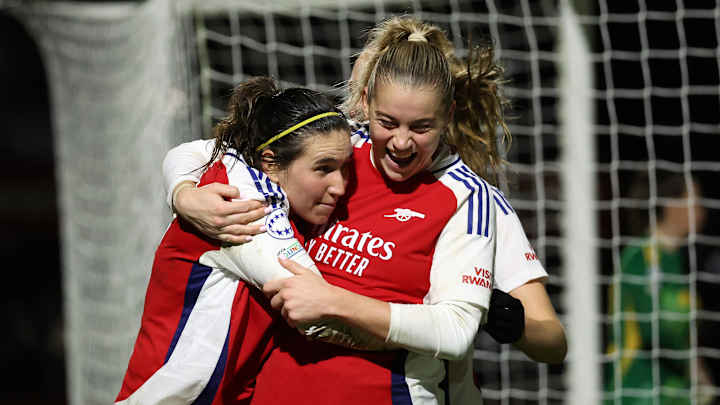 Arsenal celebrate win at Meadow Park