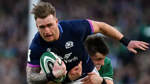 Stuart Hogg en tenue écossaise