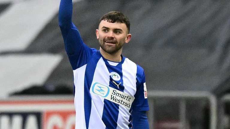 Jonny Smith célèbre son égalisation pour Wigan contre Fulham