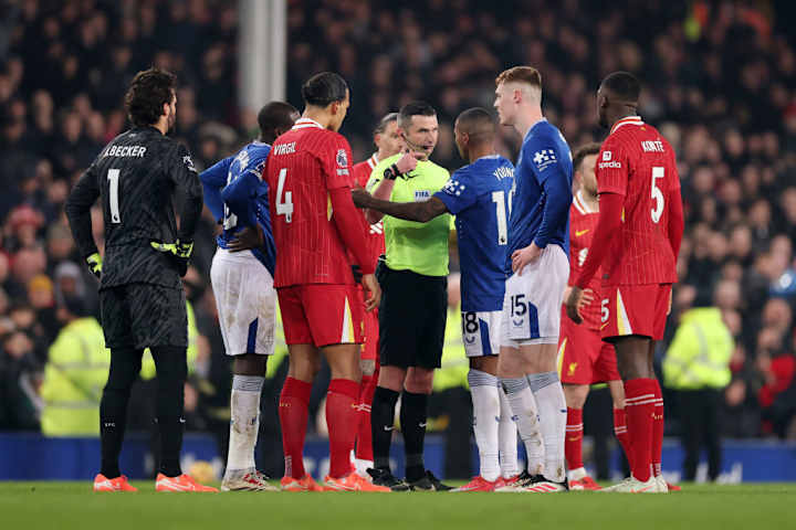 Virgil van Dijk, Michael Oliver, Ashley Young