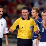 Hugh Dallas - Retour et controverses dans l-arbitrage mondial