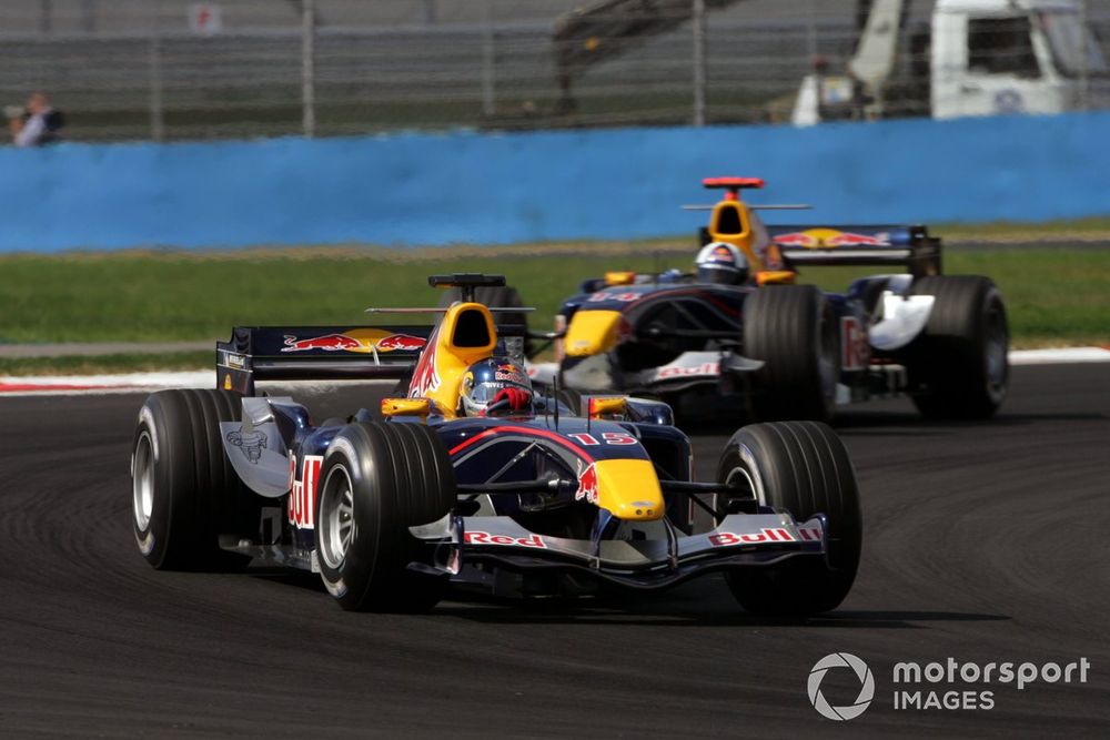 Christian Klien, Red Bull Racing RB1 leads David Coulthard, Red Bull Racing RB1