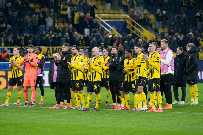 Les joueurs du Borussia Dortmund après leur qualification en barrages de la Ligue des champions contre le Sporting Portugal, le 19 février 2025.